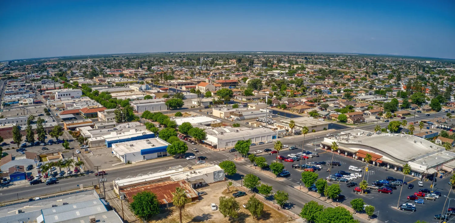 Aerial shot of Delano, California showing a nice business and residential city