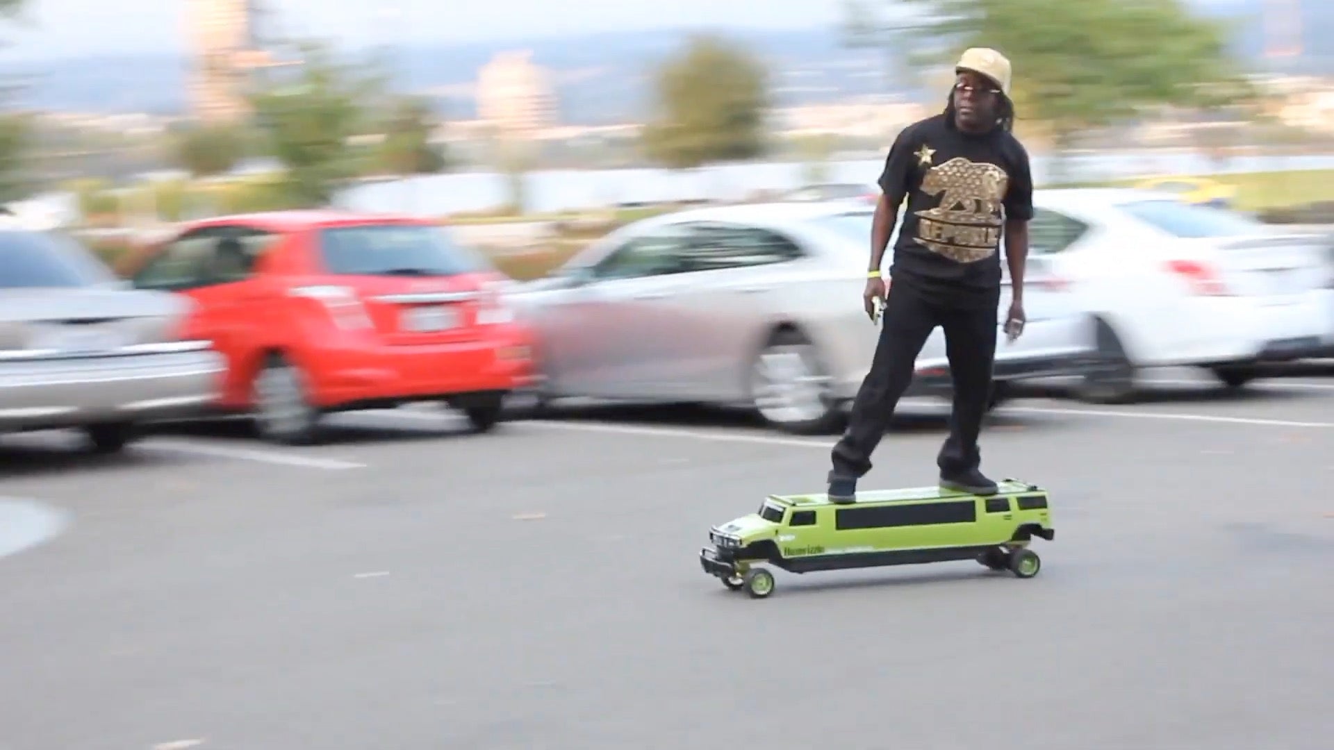 Darren Powell, founder of FreeJac Nation, riding the Humvizzle Scraperboard which is a bespoke luxury electric skateboard that looks like an exotic car